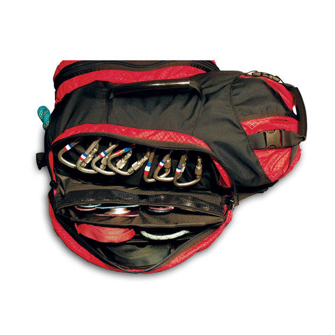 Open REACH Rigging Pack showing internal compartments and carabiners stored inside.