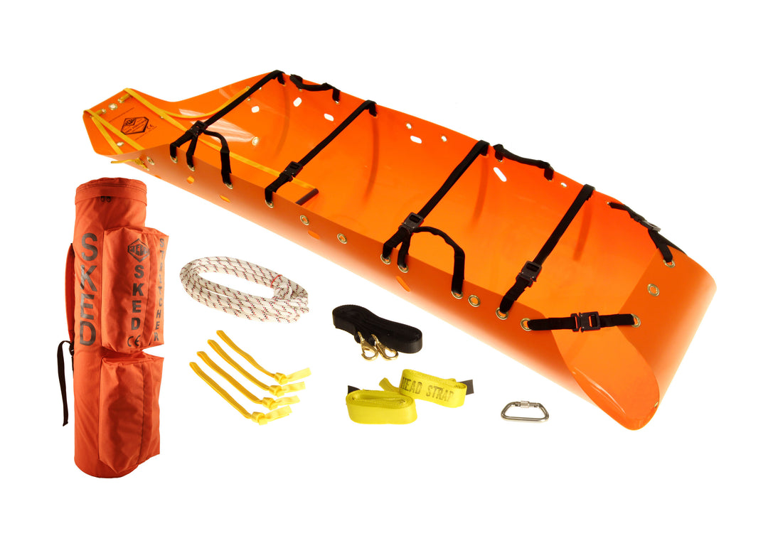 Orange Sked stretcher kit with included accessories displayed alongside, ready for assembly.
