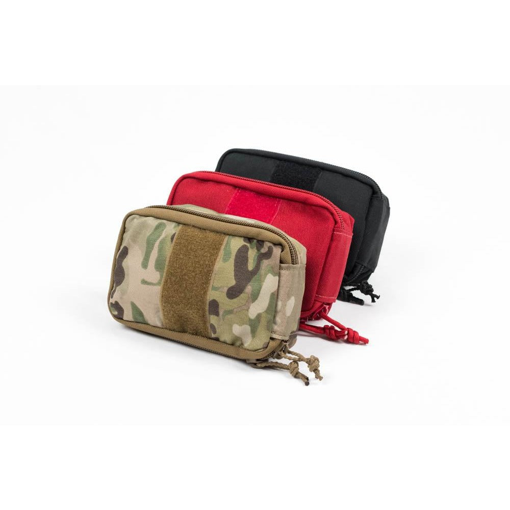 Operator IFAK pouches in red, black, and Multicam colour options. Built for visibility, utility, or tactical concealment. TacMed Australia – adaptable trauma kits for any mission.