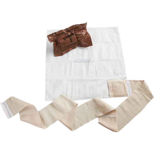 Open BLAST Bandage: Large 50x50cm trauma dressing with non-adherent pad and occlusive layer. Shown unrolled and in compact packaging. Ideal for burns, amputations, and large wounds in emergency care